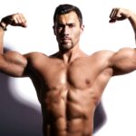 strong man with his arms raised 158538 8457